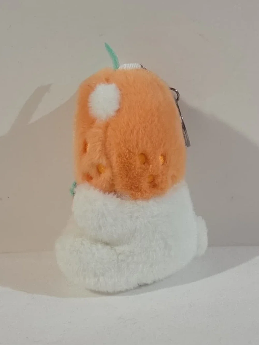 white bear with orange hat plushie keychain